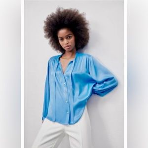 Zara Blouse with tied round collar. V-neckline and long sleeves.